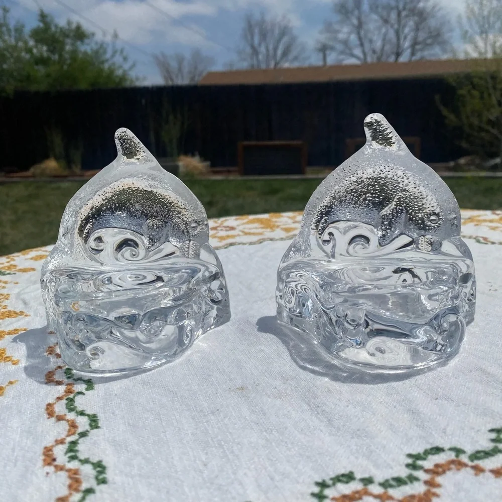 Glass dolphin and wave tea light candle holder